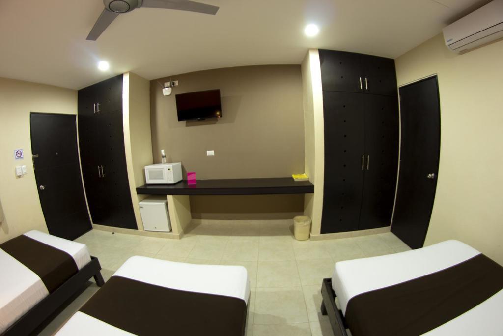 Hotel & Suites Domani Прогресо Екстериор снимка