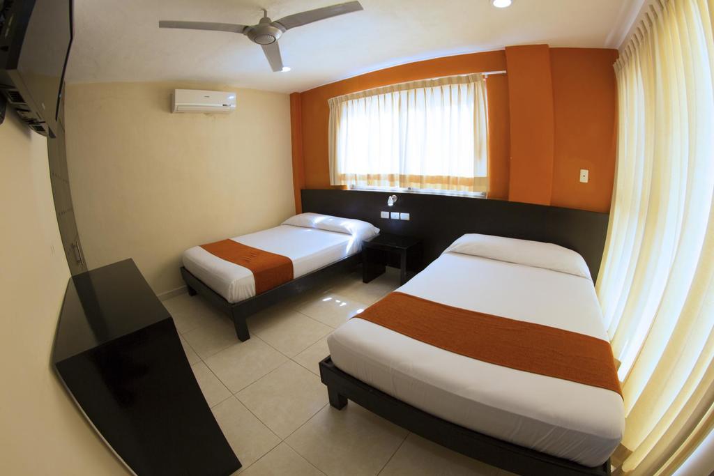 Hotel & Suites Domani Прогресо Екстериор снимка